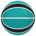 Ballon de basket turquoise et noir pour joueurs amateurs